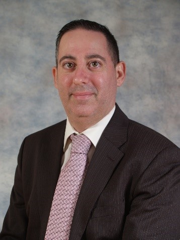 Mr Neville Brincau